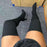 knit knee high boots Black